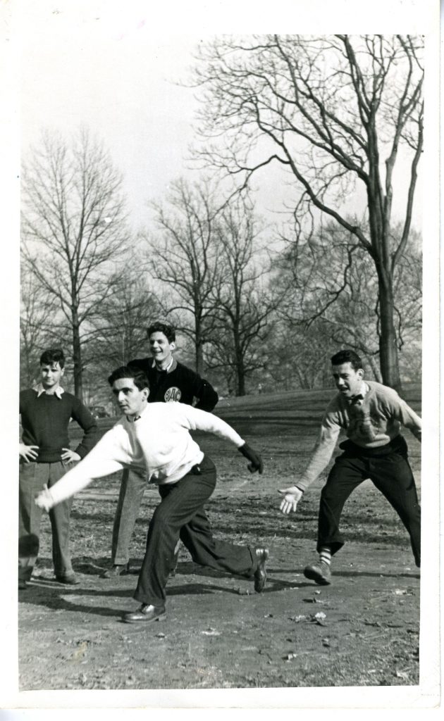 young boys playing in a local park