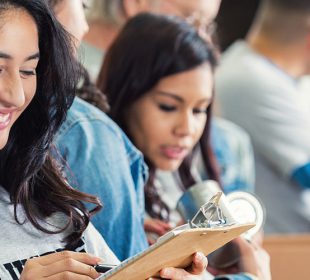 Group of Volunteers Assembling Boxes