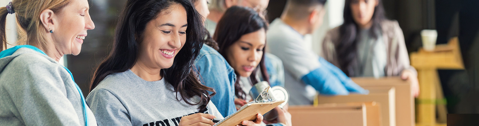 Group of Volunteers Assembling Boxes