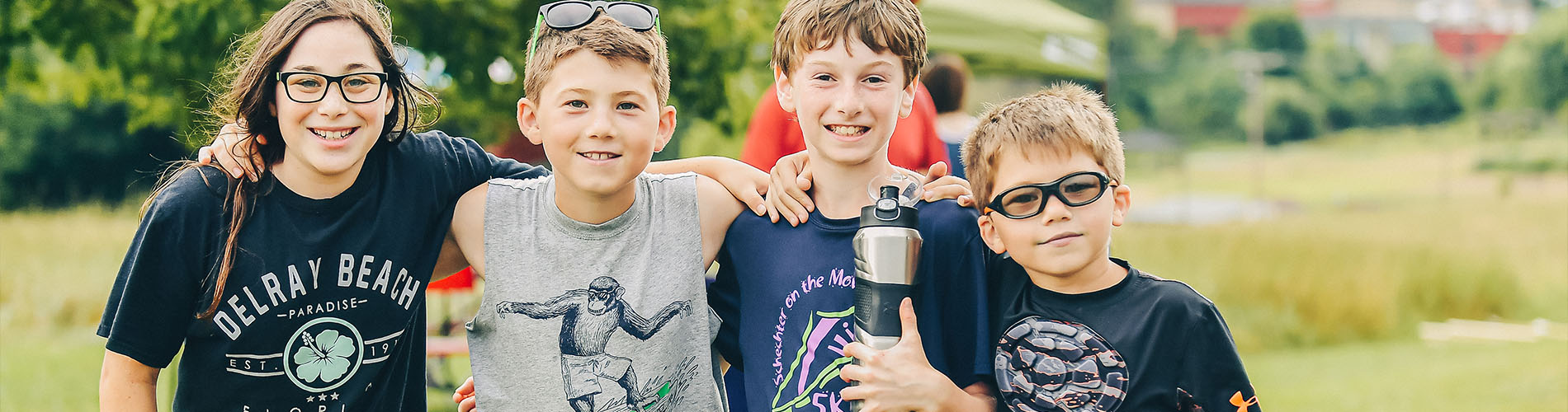 Boys smiling at Pearlstone Family Camp