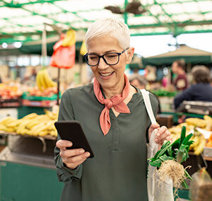 Woman at the market on her phone