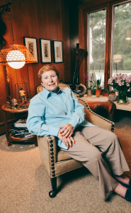 Photo of Sue Glick Liebman sitting in her living room