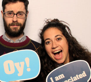 Young adults celebrating Chanukah