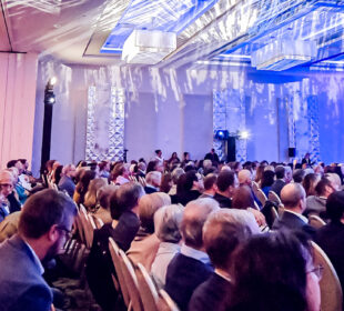 Audience members at The Associated's Keynote
