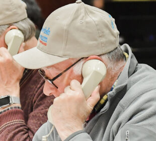 Answering phones at The Associated's Giving Tuesday