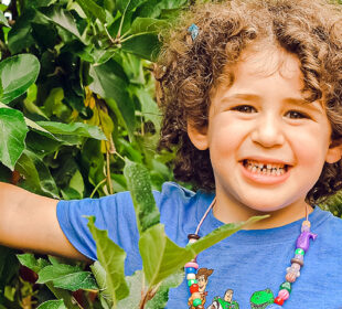 Child at PJ Library Apple Picking
