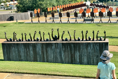 The National Memorial For Peace and Justice Sculpture depicting widespread Negro suffering in the South