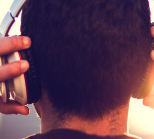 man listening to music in headphones