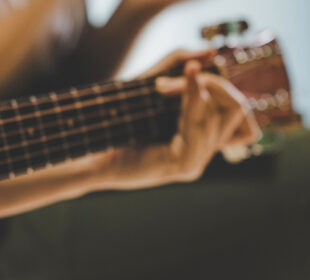 Man playing a guitar