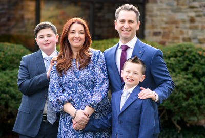 Brad Hecht with his wife Melissa and two sons