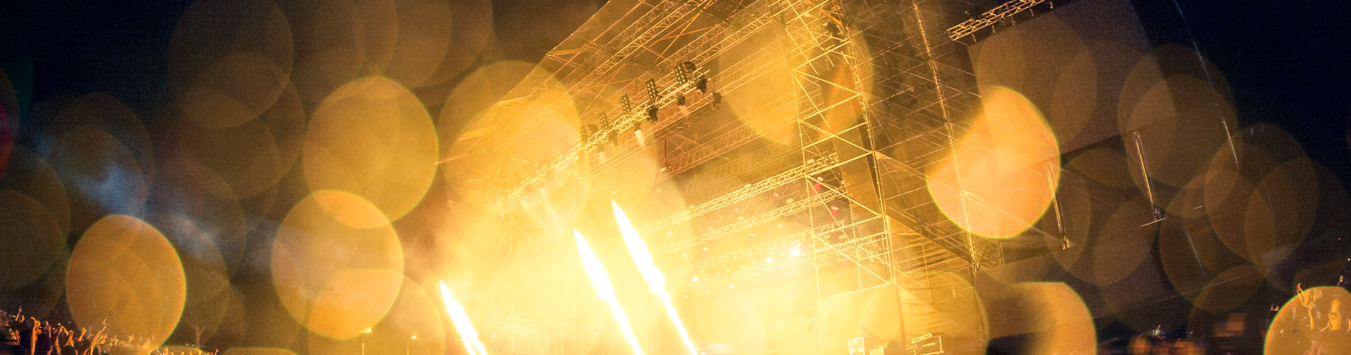 a music festival stage with bright lights