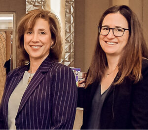 Two professional women at event
