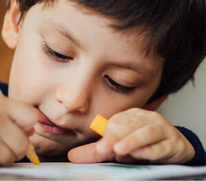 Little boy coloring