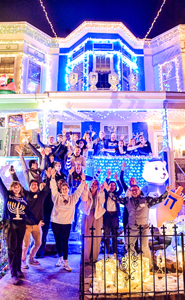 Crowd of people outside of the Chanukah house in Baltimore