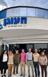 Group of people in front of the Seaside Community Center in Ashkelon