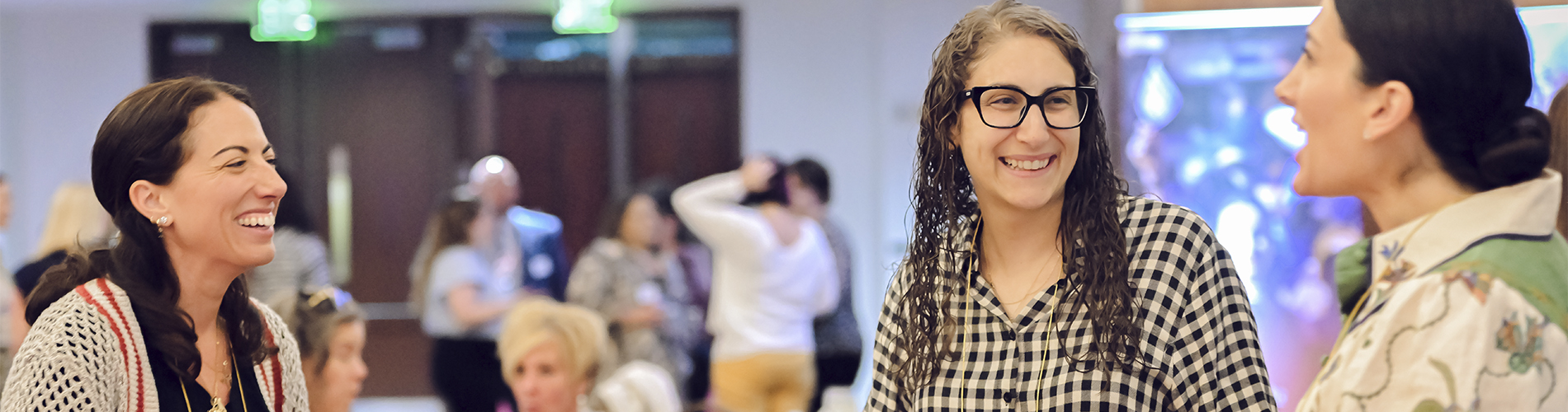 women talking at JPW LeadHERship event