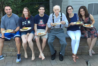 Jess Gill with her grandfather, Sabba, and his grandkids