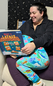 mother and son reading a book from PJ Library