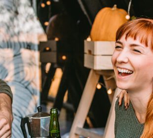 Young people eating dinner together