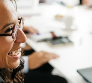 Professional woman smiling in meeting