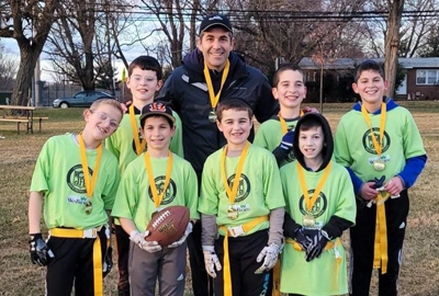 Brett Weil, coach of a flag football team.