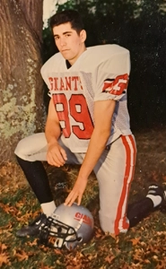 A young Brett Weil in his football uniform