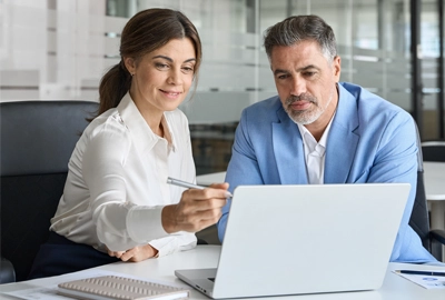 Professional consultanting client in an office meeting