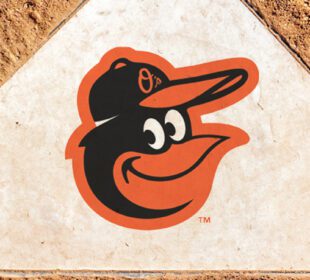 baseball base with the Baltimore Orioles logo