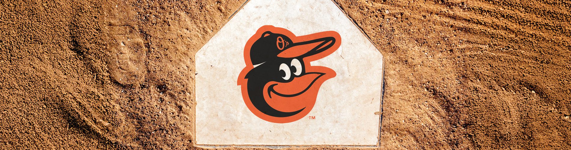 baseball base with the Baltimore Orioles logo