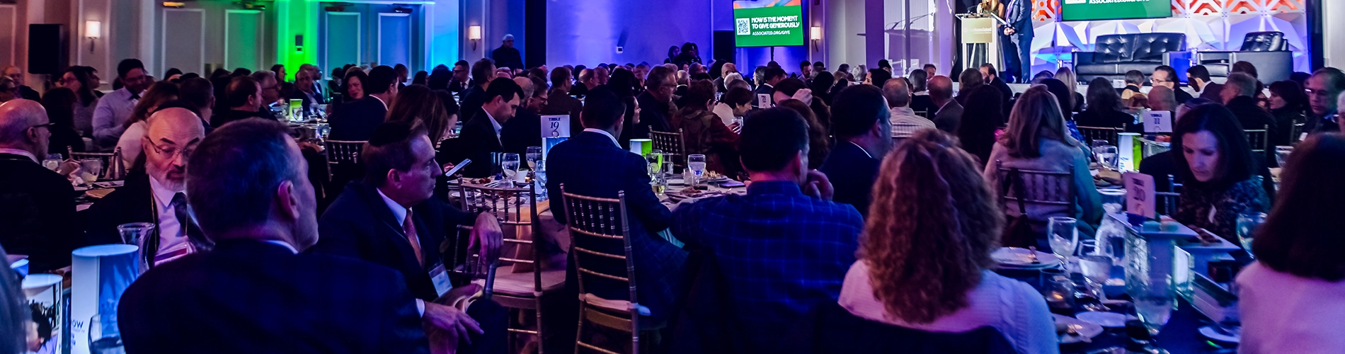 Audience members at an Associated event