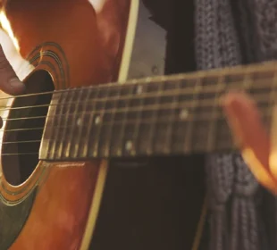 Man playing the guitar