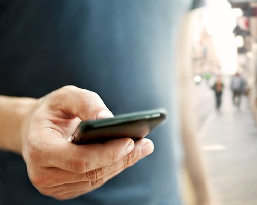 A man using his cell phone