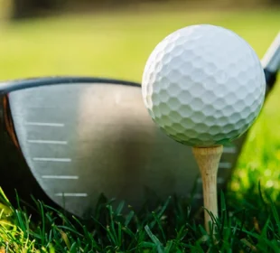golf club next to a golf ball