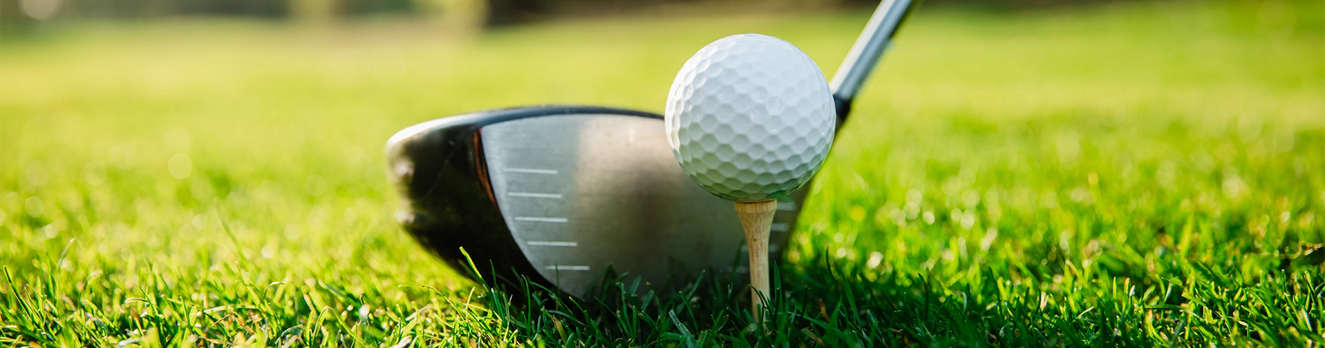 golf club next to a golf ball