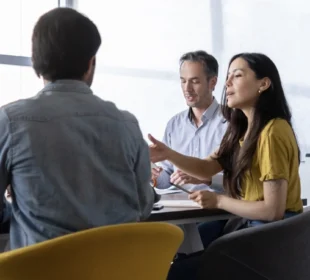 Group of business people talking in a meeting at the office