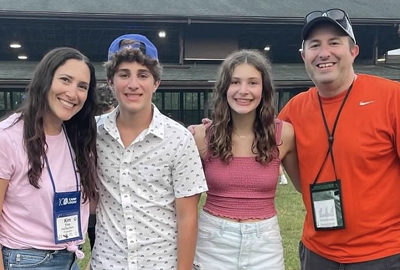 Mark with his wife Kim and two children.